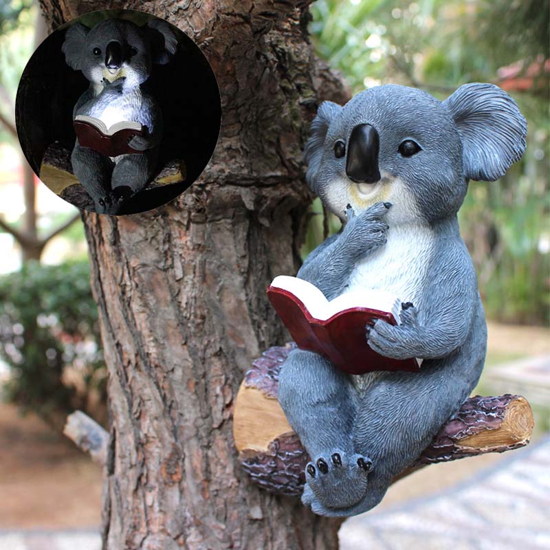 Lesender Koala Solarbetriebener